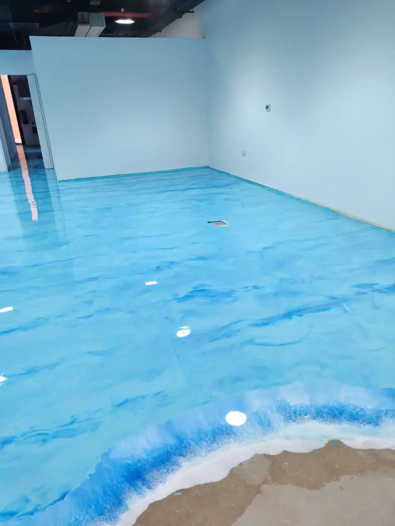 Blue wave effect decorative epoxy flooring with glossy finish