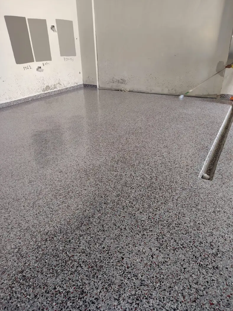 Speckled epoxy flooring with durable seamless finish in Qatar